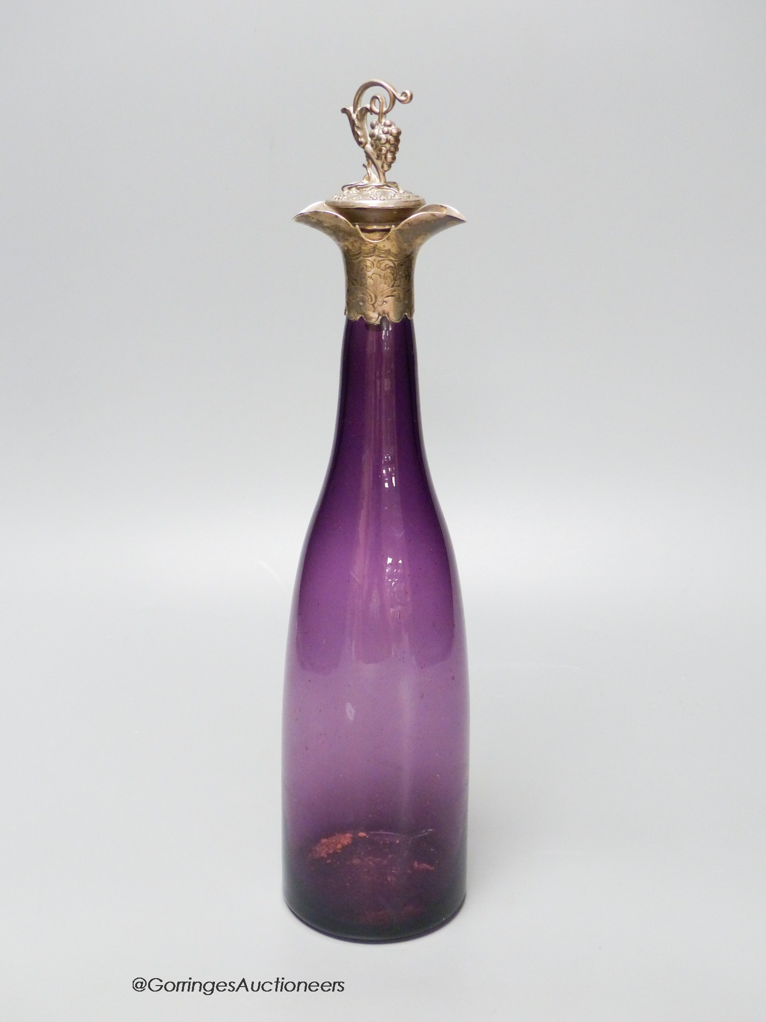 A Victorian silver mounted amethyst glass decanter, height 31cm